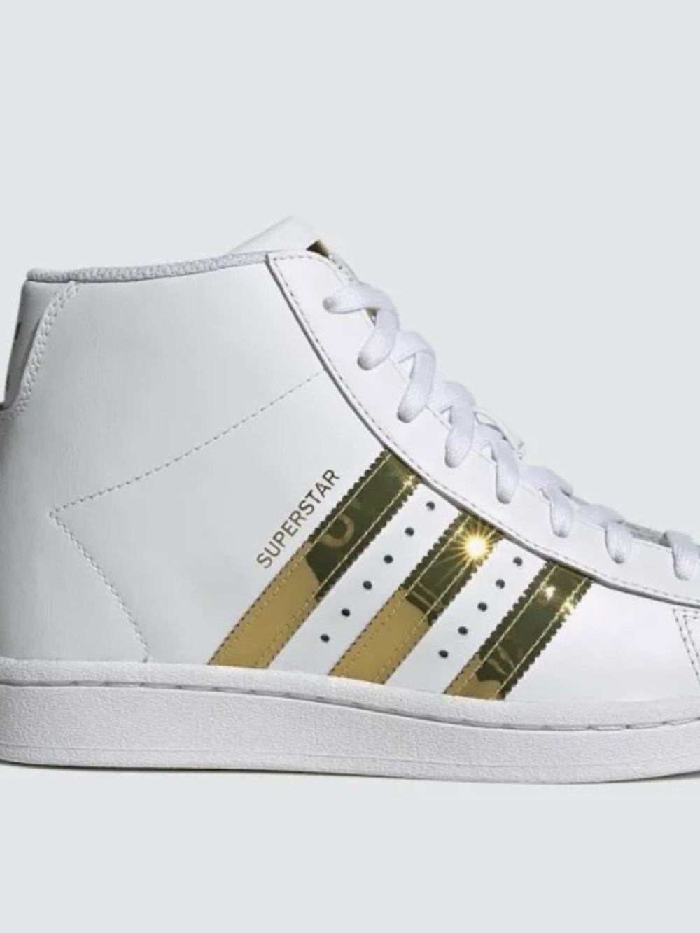adidas White Mid-Top Sneakers with Gold Stripes